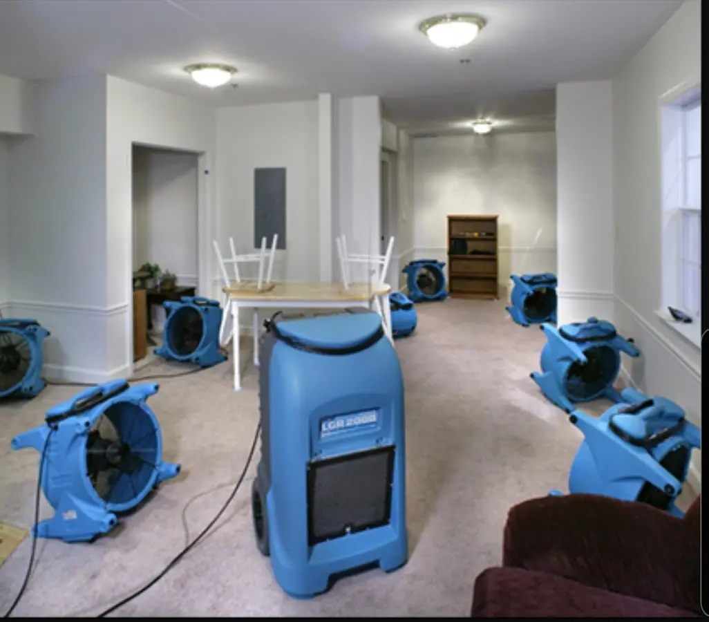 Air movers and dehumidifier setup for Water Damage Restoration in Newington Forest